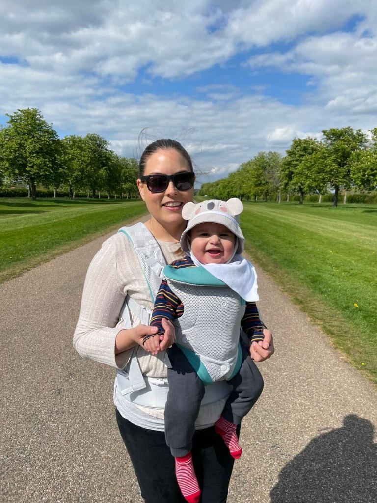 Mother and child photographed on a beautiful sunny day in the park.