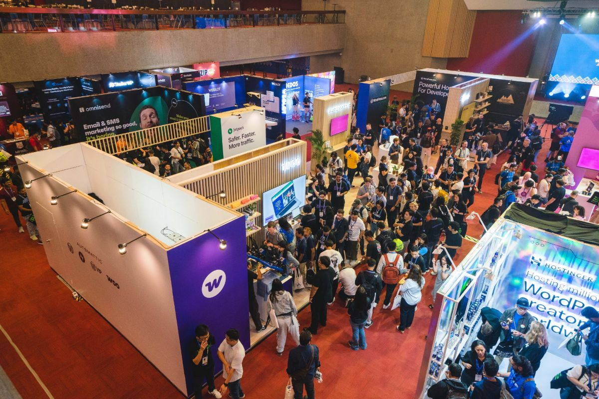 busy Automattic booth, with the companies all sharing a similar space